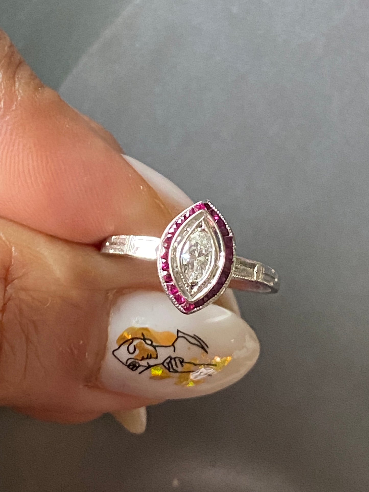 Navette Diamond and Ruby Halo Ring