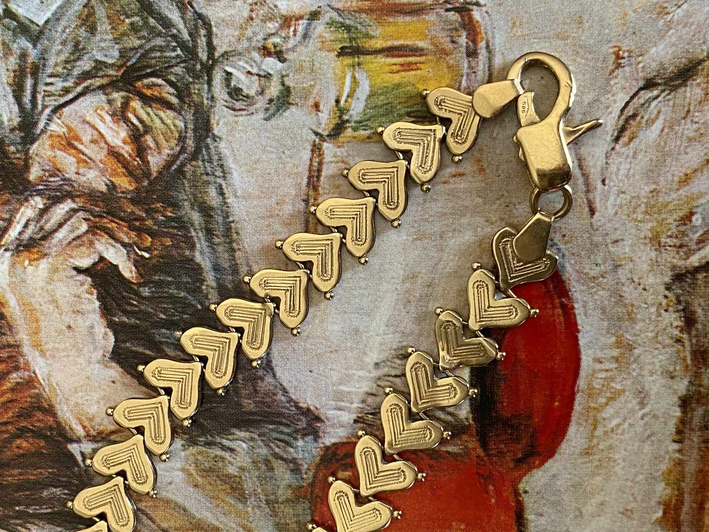 14k Articulating Hearts Bracelet