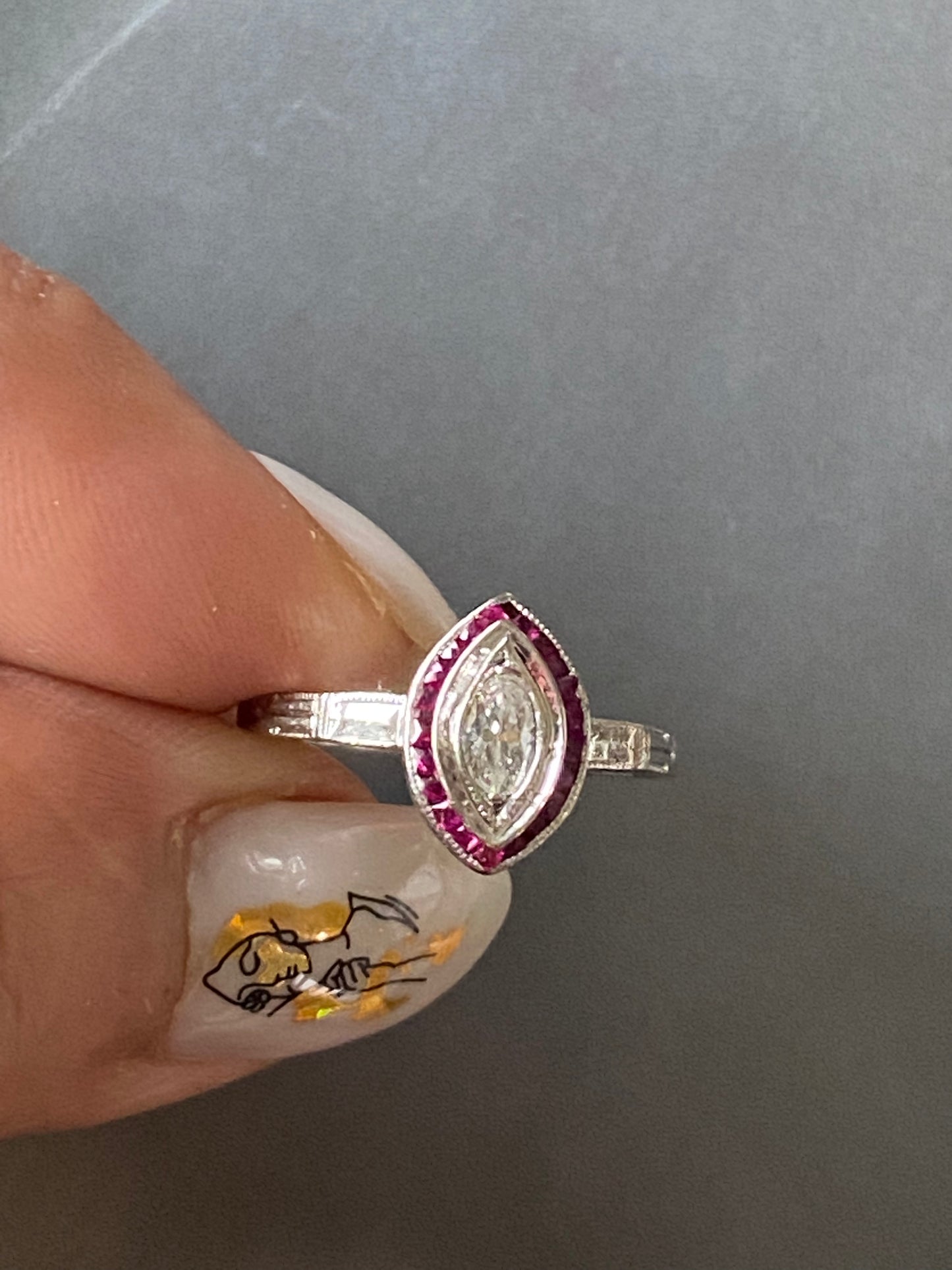 Navette Diamond and Ruby Halo Ring